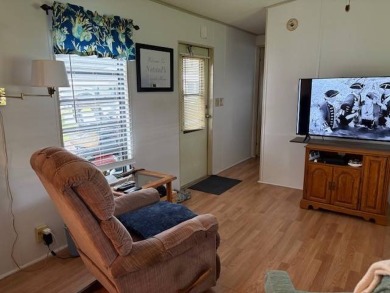 This home is in a 55 plus community with a monthly lot rent of on Crystal Lake Club in Florida - for sale on GolfHomes.com, golf home, golf lot