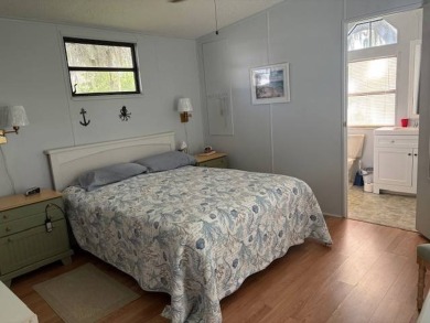 This home is in a 55 plus community with a monthly lot rent of on Crystal Lake Club in Florida - for sale on GolfHomes.com, golf home, golf lot
