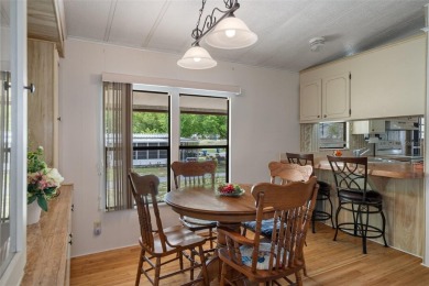 LIGHT & BRIGHT home in popular 55+ High Point Community sitting on High Point Golf Club, Inc. in Florida - for sale on GolfHomes.com, golf home, golf lot