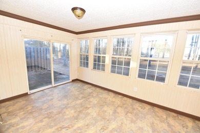 Beautiful one-level home in Fairfield Bay with stunning views of on Indian Hills Country Club in Arkansas - for sale on GolfHomes.com, golf home, golf lot