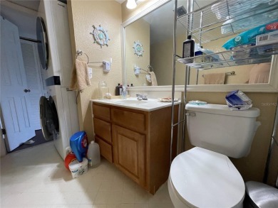 Fabulous 55+ Upstairs FURNISHED TURNKEY condo with great views on Country Club At Silver Springs Shores in Florida - for sale on GolfHomes.com, golf home, golf lot