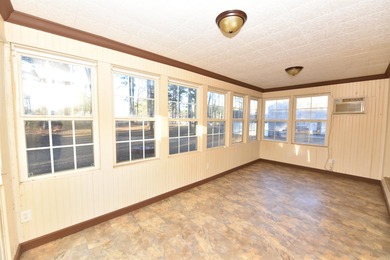 Beautiful one-level home in Fairfield Bay with stunning views of on Indian Hills Country Club in Arkansas - for sale on GolfHomes.com, golf home, golf lot