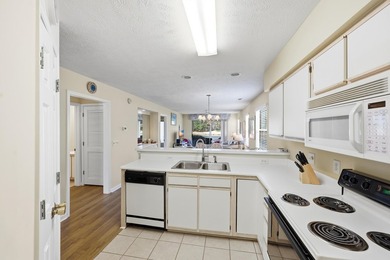 This furnished 3-bedroom, end-unit condo is located in the on True Blue Plantation in South Carolina - for sale on GolfHomes.com, golf home, golf lot