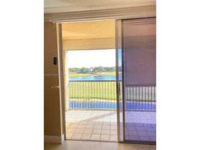 Amazing 2/2 on the 4th Floor unit, overlooking the lake & golf on Grande Oaks Golf Club in Florida - for sale on GolfHomes.com, golf home, golf lot