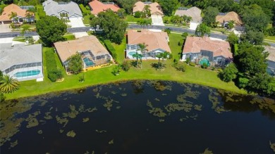 PARADISE Awaits in this SPECTACULAR WATERFRONT Home Located in on Crescent Oaks Country Club in Florida - for sale on GolfHomes.com, golf home, golf lot