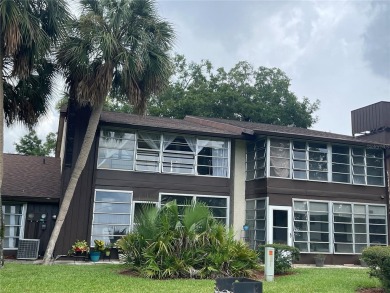Fabulous 55+ Upstairs FURNISHED TURNKEY condo with great views on Country Club At Silver Springs Shores in Florida - for sale on GolfHomes.com, golf home, golf lot