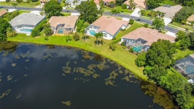 PARADISE Awaits in this SPECTACULAR WATERFRONT Home Located in on Crescent Oaks Country Club in Florida - for sale on GolfHomes.com, golf home, golf lot