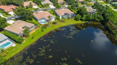 PARADISE Awaits in this SPECTACULAR WATERFRONT Home Located in on Crescent Oaks Country Club in Florida - for sale on GolfHomes.com, golf home, golf lot