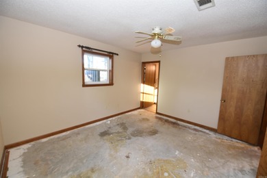 Beautiful one-level home in Fairfield Bay with stunning views of on Indian Hills Country Club in Arkansas - for sale on GolfHomes.com, golf home, golf lot