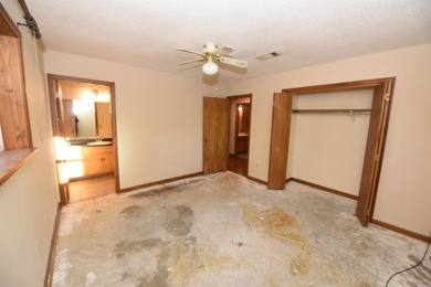 Beautiful one-level home in Fairfield Bay with stunning views of on Indian Hills Country Club in Arkansas - for sale on GolfHomes.com, golf home, golf lot