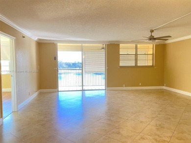 Amazing 2/2 on the 4th Floor unit, overlooking the lake & golf on Grande Oaks Golf Club in Florida - for sale on GolfHomes.com, golf home, golf lot