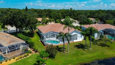 PARADISE Awaits in this SPECTACULAR WATERFRONT Home Located in on Crescent Oaks Country Club in Florida - for sale on GolfHomes.com, golf home, golf lot