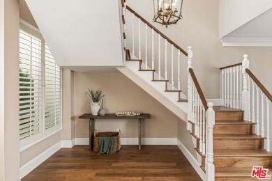 This stunning townhouse with panoramic mountain and hillside on Mountain Gate Country Club in California - for sale on GolfHomes.com, golf home, golf lot