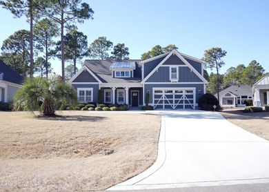 Step inside this luxury coastal craftsman, pristine Riptide home on Sea Trail Golf Resort in North Carolina - for sale on GolfHomes.com, golf home, golf lot