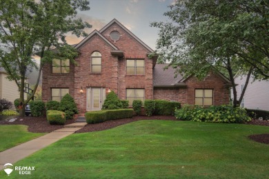 This stunning 5-bedroom, 3-bathroom home spans over 3,600 square on The Captains Club At Woodfield in Michigan - for sale on GolfHomes.com, golf home, golf lot