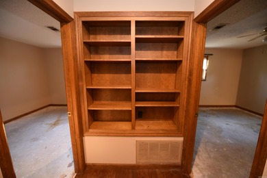 Beautiful one-level home in Fairfield Bay with stunning views of on Indian Hills Country Club in Arkansas - for sale on GolfHomes.com, golf home, golf lot