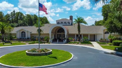 PARADISE Awaits in this SPECTACULAR WATERFRONT Home Located in on Crescent Oaks Country Club in Florida - for sale on GolfHomes.com, golf home, golf lot