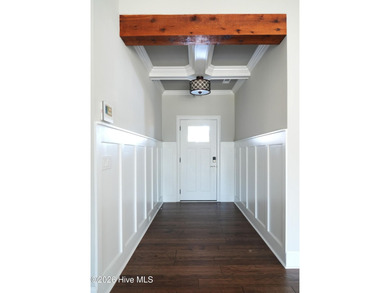 Step inside this luxury coastal craftsman, pristine Riptide home on Sea Trail Golf Resort in North Carolina - for sale on GolfHomes.com, golf home, golf lot