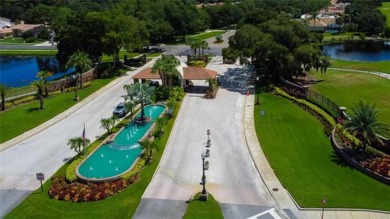 PARADISE Awaits in this SPECTACULAR WATERFRONT Home Located in on Crescent Oaks Country Club in Florida - for sale on GolfHomes.com, golf home, golf lot