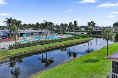 THE ONE YOU'VE BEEN WAITING FOR!  Water & Pool VIEWS and on Addison Reserve in Florida - for sale on GolfHomes.com, golf home, golf lot
