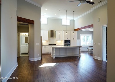 Step inside this luxury coastal craftsman, pristine Riptide home on Sea Trail Golf Resort in North Carolina - for sale on GolfHomes.com, golf home, golf lot