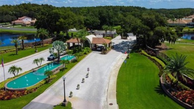 PARADISE Awaits in this SPECTACULAR WATERFRONT Home Located in on Crescent Oaks Country Club in Florida - for sale on GolfHomes.com, golf home, golf lot