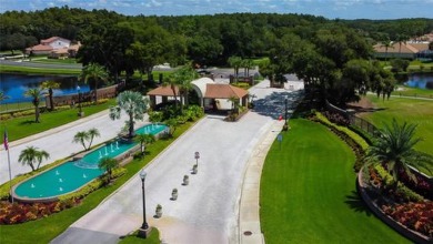 PARADISE Awaits in this SPECTACULAR WATERFRONT Home Located in on Crescent Oaks Country Club in Florida - for sale on GolfHomes.com, golf home, golf lot