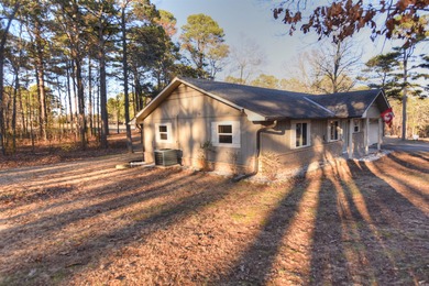 Beautiful one-level home in Fairfield Bay with stunning views of on Indian Hills Country Club in Arkansas - for sale on GolfHomes.com, golf home, golf lot