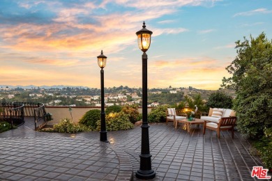 This stunning townhouse with panoramic mountain and hillside on Mountain Gate Country Club in California - for sale on GolfHomes.com, golf home, golf lot