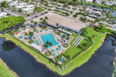 THE ONE YOU'VE BEEN WAITING FOR!  Water & Pool VIEWS and on Addison Reserve in Florida - for sale on GolfHomes.com, golf home, golf lot