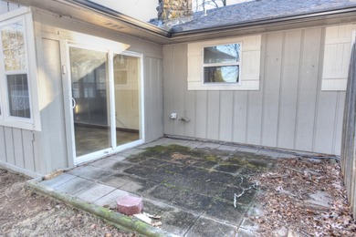 Beautiful one-level home in Fairfield Bay with stunning views of on Indian Hills Country Club in Arkansas - for sale on GolfHomes.com, golf home, golf lot