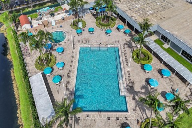 THE ONE YOU'VE BEEN WAITING FOR!  Water & Pool VIEWS and on Addison Reserve in Florida - for sale on GolfHomes.com, golf home, golf lot