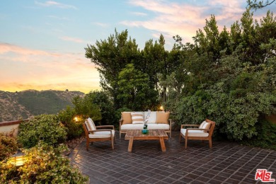This stunning townhouse with panoramic mountain and hillside on Mountain Gate Country Club in California - for sale on GolfHomes.com, golf home, golf lot