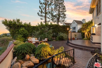 This stunning townhouse with panoramic mountain and hillside on Mountain Gate Country Club in California - for sale on GolfHomes.com, golf home, golf lot