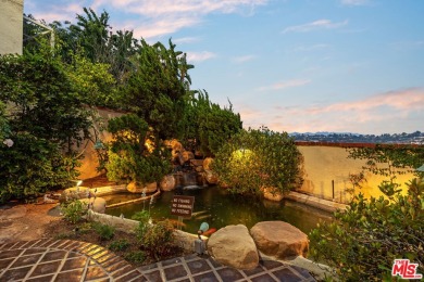 This stunning townhouse with panoramic mountain and hillside on Mountain Gate Country Club in California - for sale on GolfHomes.com, golf home, golf lot