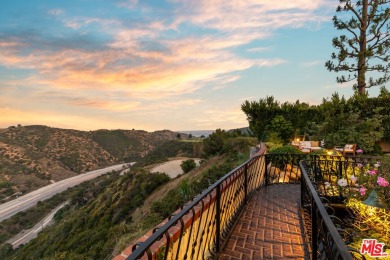 This stunning townhouse with panoramic mountain and hillside on Mountain Gate Country Club in California - for sale on GolfHomes.com, golf home, golf lot