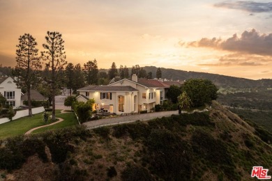 This stunning townhouse with panoramic mountain and hillside on Mountain Gate Country Club in California - for sale on GolfHomes.com, golf home, golf lot