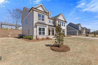 Nestled in the sought-after Traditions of Braselton community on Traditions of Braselton Golf Club in Georgia - for sale on GolfHomes.com, golf home, golf lot