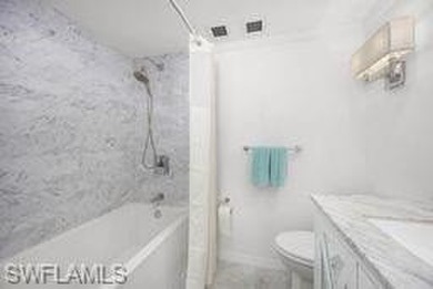 Sophisticated living space with a golf course view for a on High Point Country Club in Florida - for sale on GolfHomes.com, golf home, golf lot