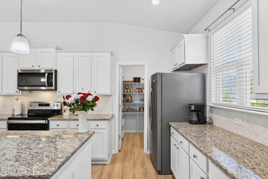 Living is easy in this Nearly New Tasteful Open-Concept on Brunswick Plantation and Golf Resorts in North Carolina - for sale on GolfHomes.com, golf home, golf lot