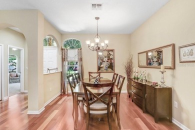 Under contract-accepting backup offers. Immaculate Pool Home on on The Eagles Golf Course and Club in Florida - for sale on GolfHomes.com, golf home, golf lot