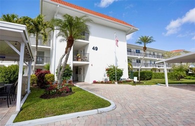 Sophisticated living space with a golf course view for a on High Point Country Club in Florida - for sale on GolfHomes.com, golf home, golf lot