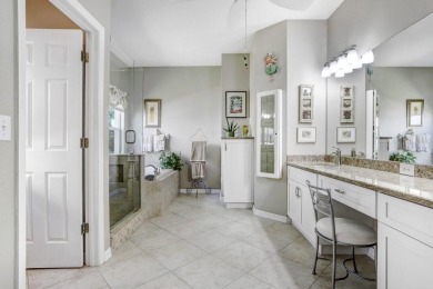 Under contract-accepting backup offers. Immaculate Pool Home on on The Eagles Golf Course and Club in Florida - for sale on GolfHomes.com, golf home, golf lot