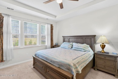 Living is easy in this Nearly New Tasteful Open-Concept on Brunswick Plantation and Golf Resorts in North Carolina - for sale on GolfHomes.com, golf home, golf lot