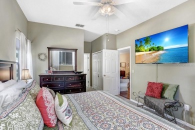 Under contract-accepting backup offers. Immaculate Pool Home on on The Eagles Golf Course and Club in Florida - for sale on GolfHomes.com, golf home, golf lot