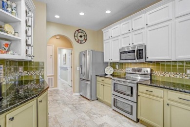 Under contract-accepting backup offers. Immaculate Pool Home on on The Eagles Golf Course and Club in Florida - for sale on GolfHomes.com, golf home, golf lot