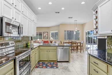 Under contract-accepting backup offers. Immaculate Pool Home on on The Eagles Golf Course and Club in Florida - for sale on GolfHomes.com, golf home, golf lot