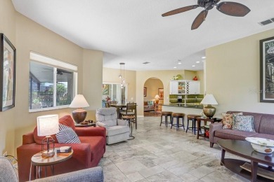 Under contract-accepting backup offers. Immaculate Pool Home on on The Eagles Golf Course and Club in Florida - for sale on GolfHomes.com, golf home, golf lot