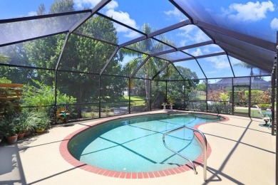 Under contract-accepting backup offers. Immaculate Pool Home on on The Eagles Golf Course and Club in Florida - for sale on GolfHomes.com, golf home, golf lot