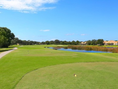 Under contract-accepting backup offers. Imagine living in this on Pelican Pointe Golf and Country Club in Florida - for sale on GolfHomes.com, golf home, golf lot